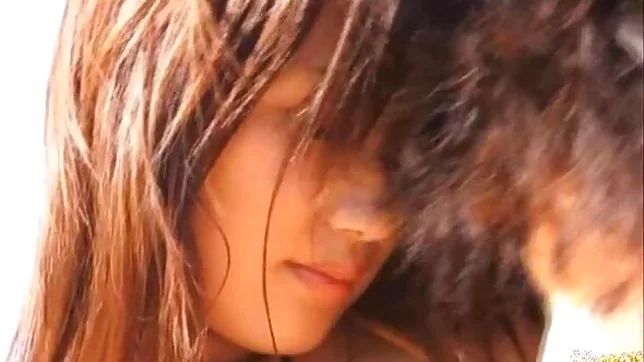 Rio Fujisaki Lovely Asian teen is fucked on the beach 6