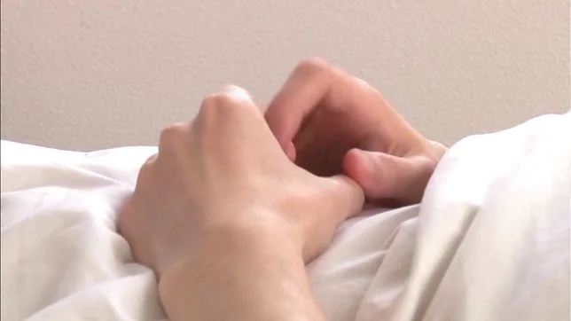 Beautiful teen nurse Uruha Mizuki gives a great handjob