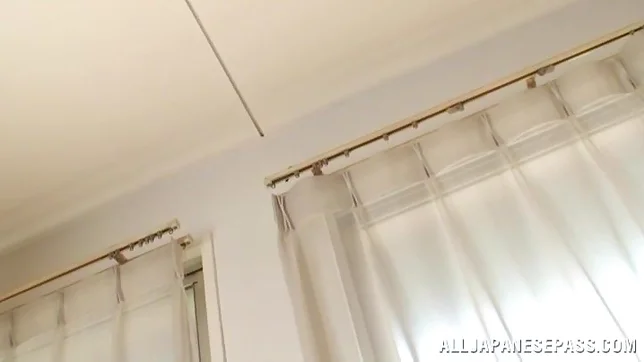 Adorable Japanese babe Tsubomi frills her slit with a sex toy 2