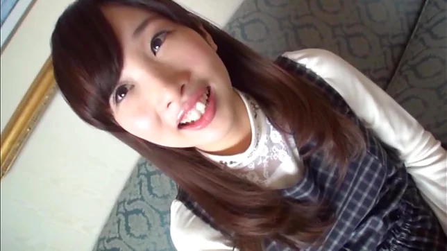 Shy looking Japanese girl gets pussy stretched and fingered