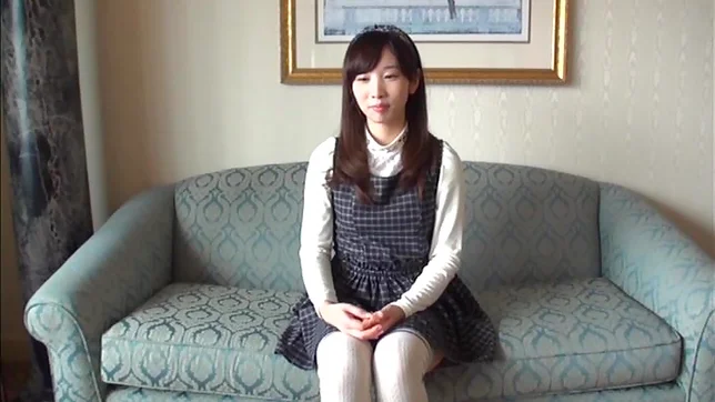 Shy looking Japanese girl gets pussy stretched and fingered