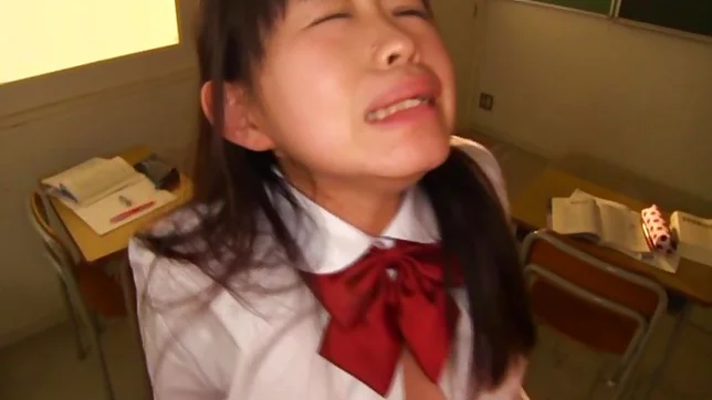 Delicious Japanese teen chick Kaho Mizuzaki stretches pussy for banging