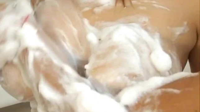 Moka Asian model plays with cock in the shower 3