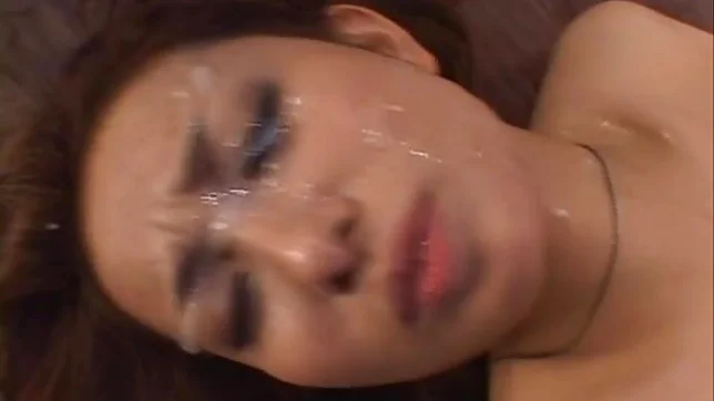 Nao Yoshizaki Sexy Asian doll enjoys a cum facial 3