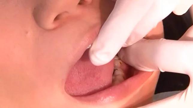 Juicy Japanese AV model is screwed by a horny dentist