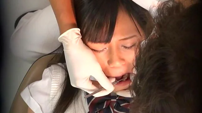 Juicy Japanese AV model is screwed by a horny dentist 2