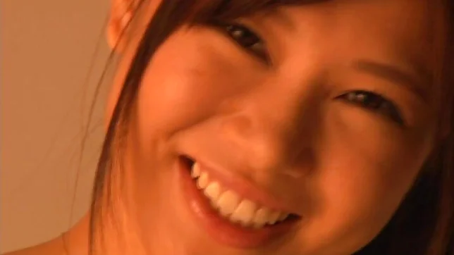 Playful Japanese AV model Ayumi Hasegawa shows off her big tits