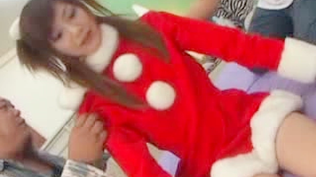 Innocent Asian babe dressed as Santa gets gang banged
